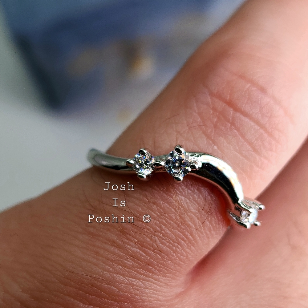 0.13CTW Moissanite ring band in rhodium over sterling silver